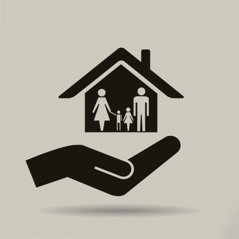 house with family and hand holding up the house